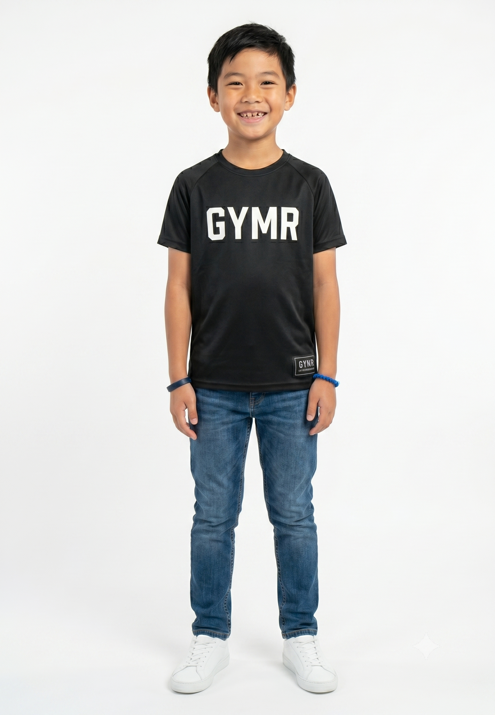 Child wearing a black 'GYMR' t-shirt and blue jeans on a white background