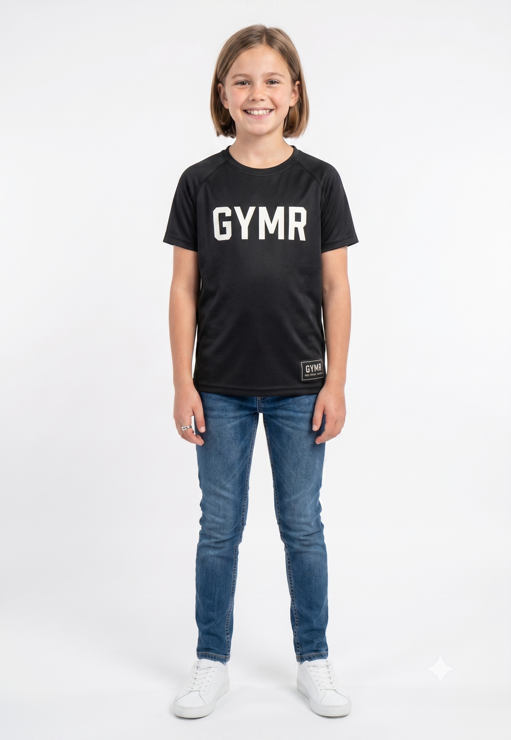 Child wearing a black t-shirt with 'GYMR' text and blue jeans on a white background