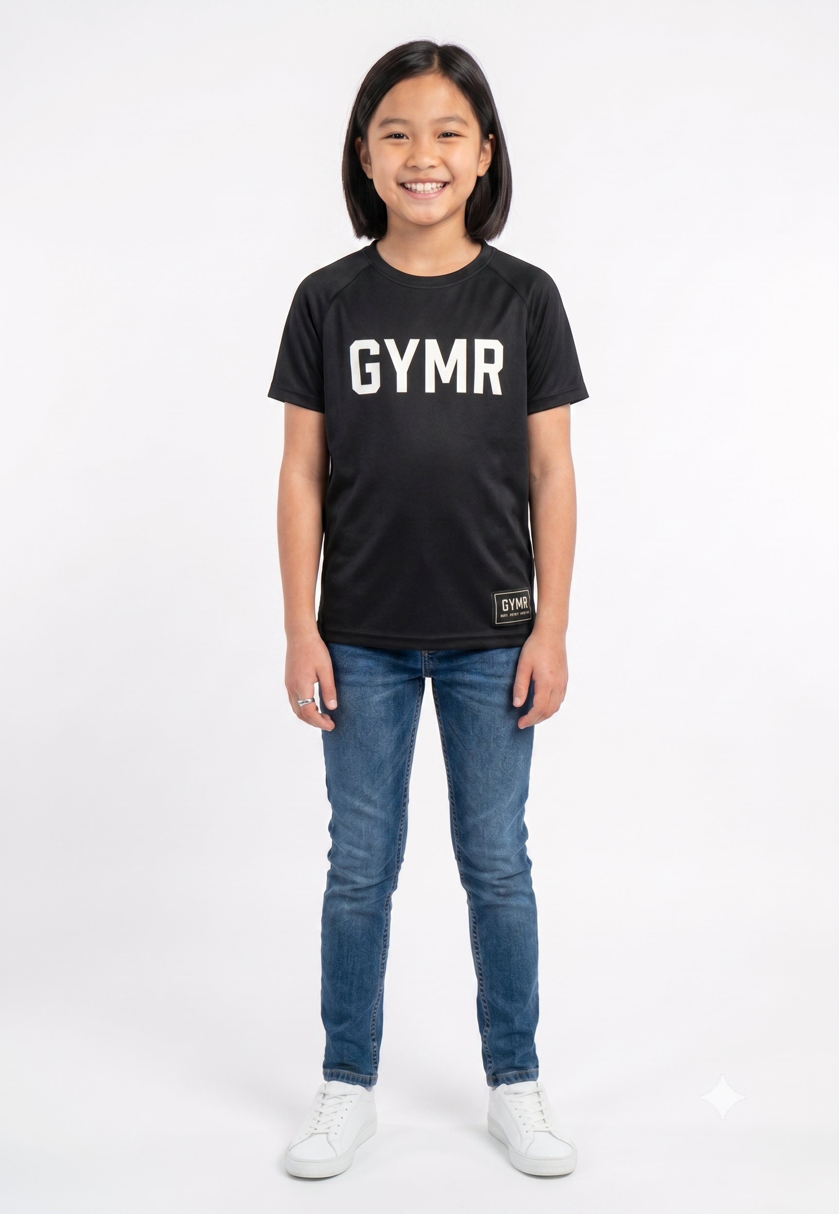 Child wearing a black t-shirt with 'GYMR' printed on it against a white background