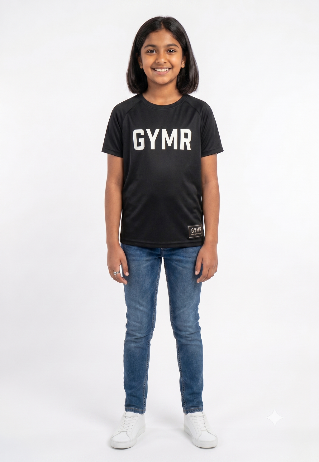 Person wearing a black 'GYMR' t-shirt and blue jeans on a white background